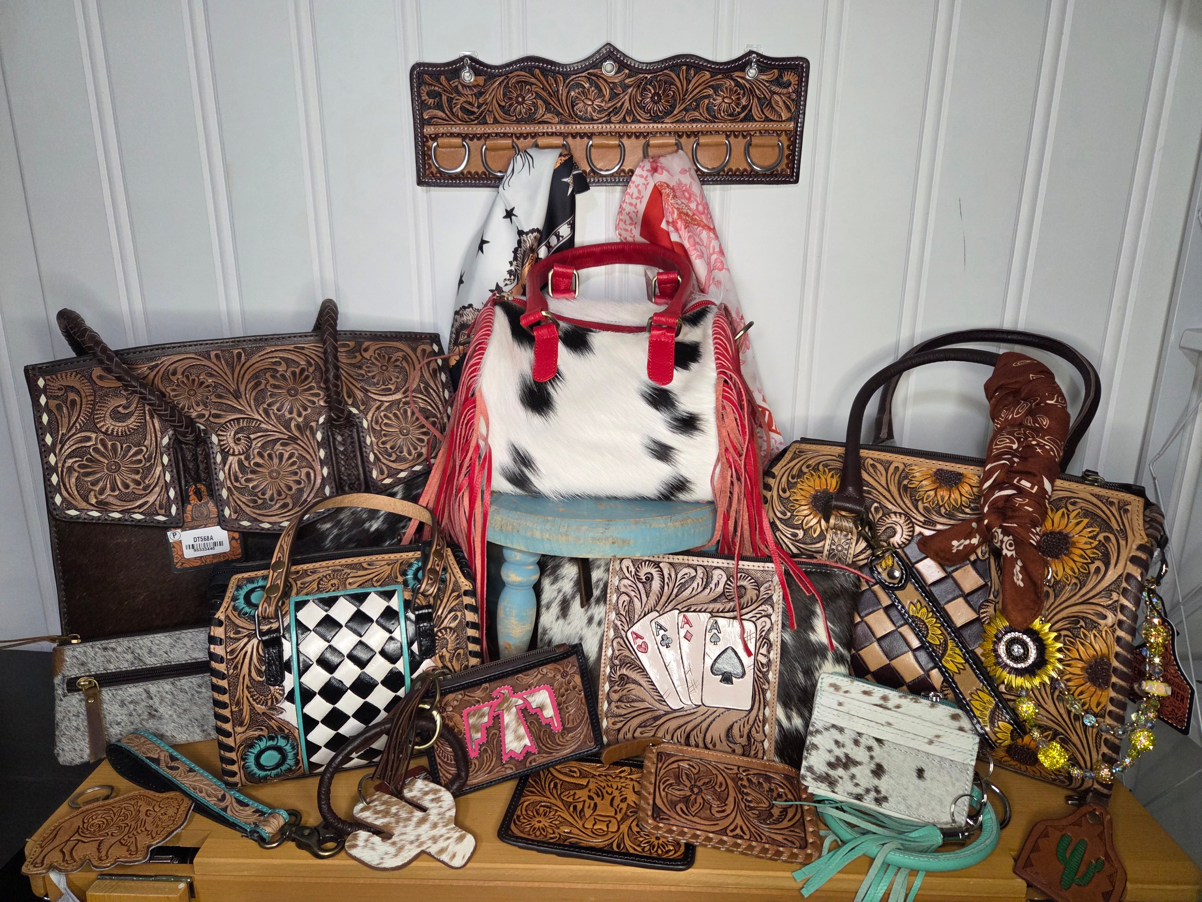 Genunine Leather, hand tooled, hand painted, purses, coin pouches,  key chains, key wristlets, wildrag holder,  and 2 polyester wildrags.